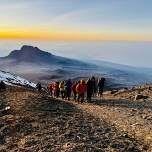 Hikers at the top of Mount Kilimanjaro