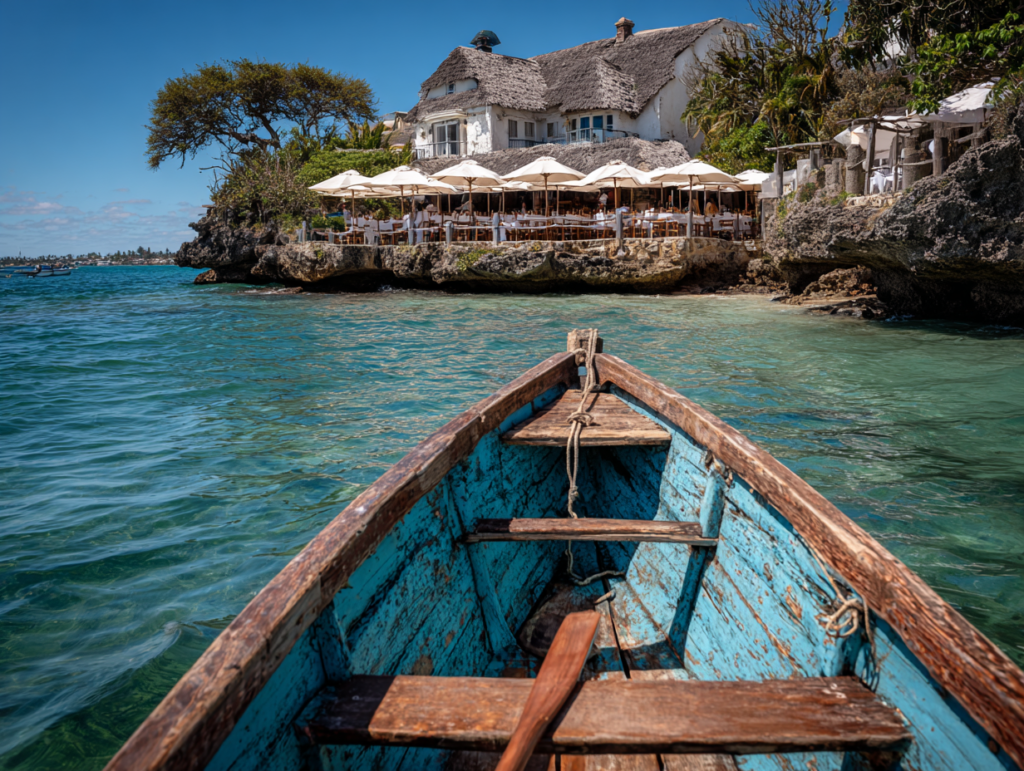 Boat approaching The Rock Restaurant at high tide in Zanzibar