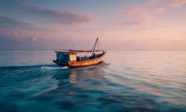 Fishing boat heading offshore during a deep sea fishing experience in Zanzibar