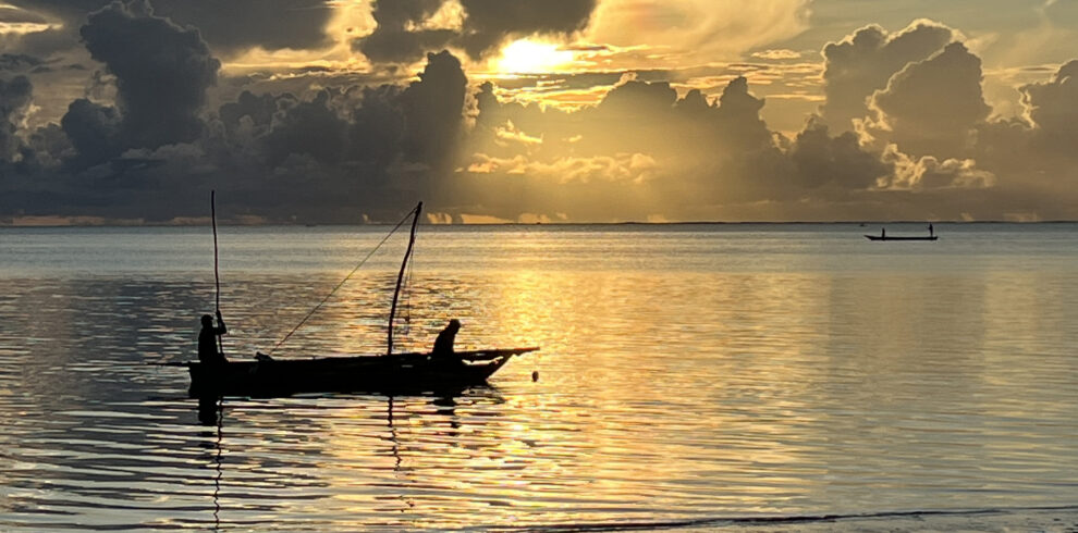 Traditional Fishing Boat at sunrise off the coast of Zanzibar at Jambiani