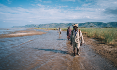 Guide and guests walking quietly in the Lake Eyasi area