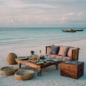 Private beach picnic setup on a secluded Zanzibar beach in the evening