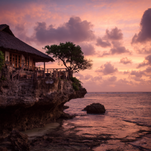 The Rock Restaurant silhouetted against the evening sky in Zanzibar