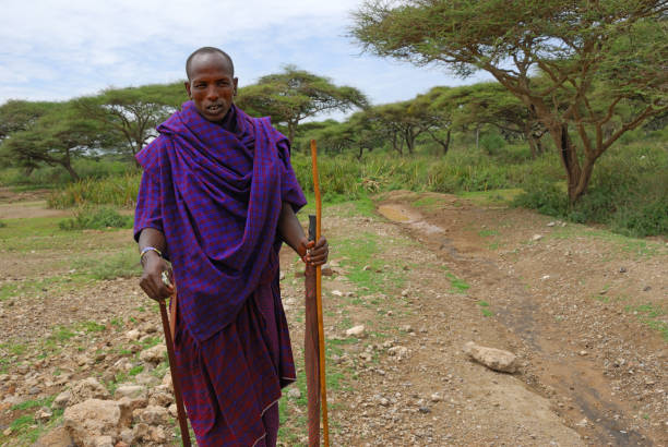 Masai tribesman in Serengeti National Park, Tanzania promoting responsible tourism and cultural preservation