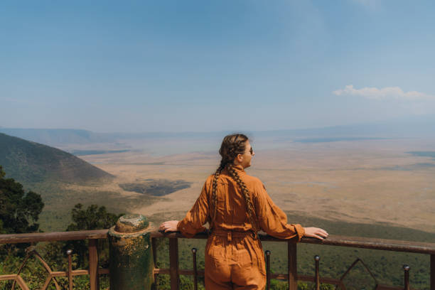Couple enjoying the scenic views of Ngorongoro Crater, a natural wonder in Tanzania, during a Romantic Safari Adventure