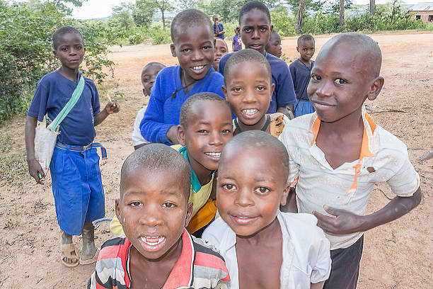 Children in a Tanzanian village near Mgandu, highlighting responsible tourism supporting local communities