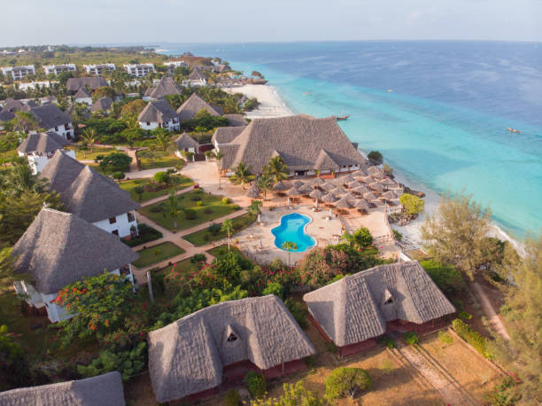 Luxury villas along the turquoise ocean coast in Zanzibar near the Best Snorkeling Spots in Zanzibar