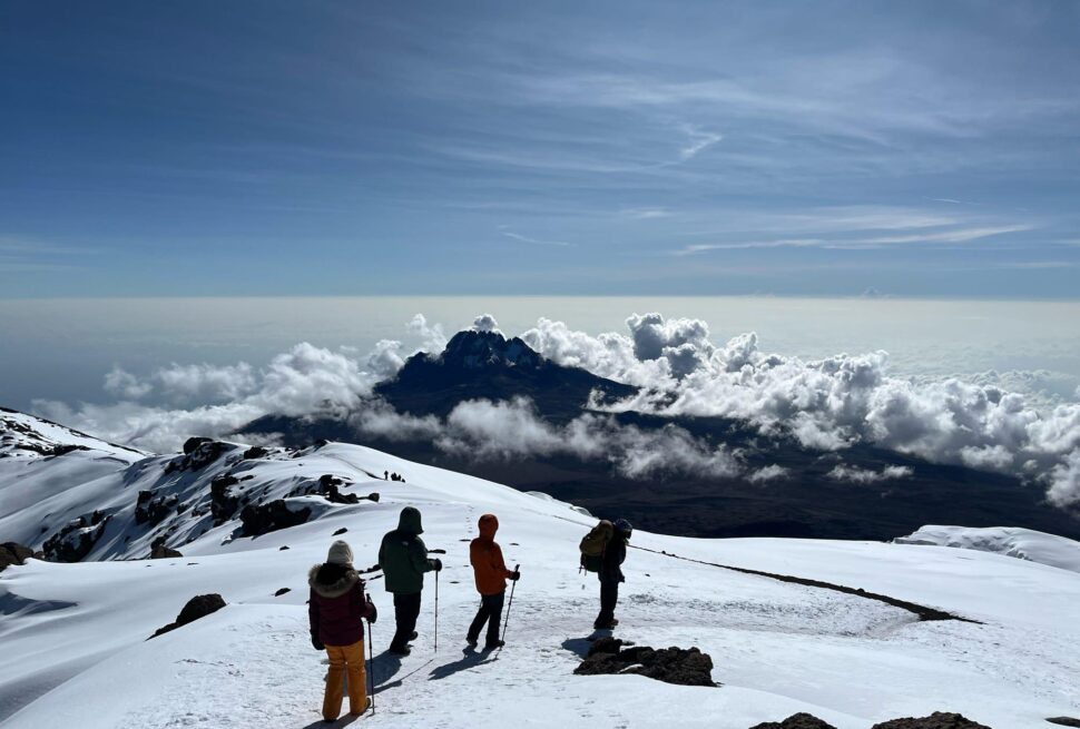 Climbers ascending Mount Kilimanjaro during a trek highlighting climbing Mount Kilimanjaro facts
