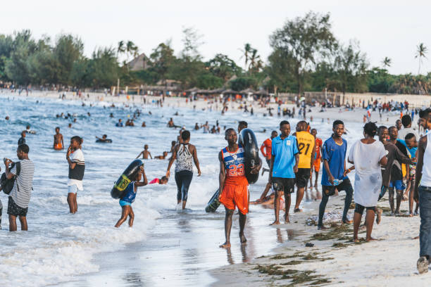 African people enjoying Coco Beach in Dar es Salaam during a weekend Dar es Salaam City Tour experience in Tanzania