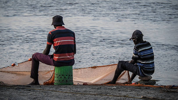 Lake Eyasi Cultural Experience – Local fishermen working on Lake Eyasi Tanzania at sunrise