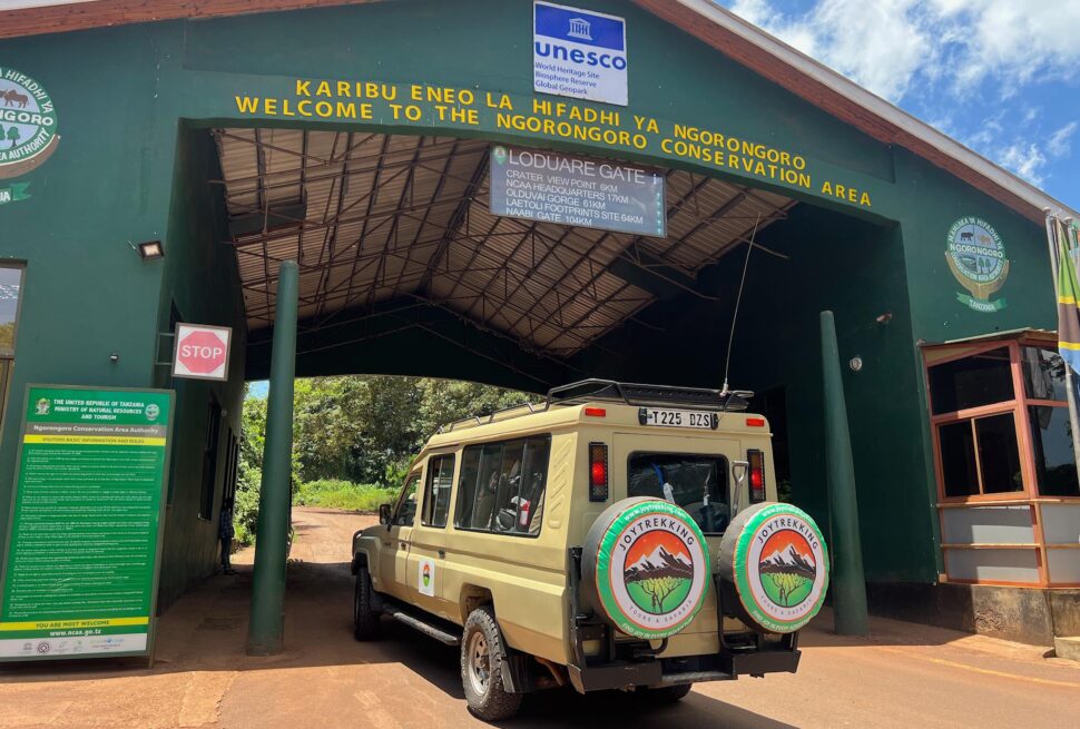 JoyTrekking Tours & Safaris Land Cruiser at the Ngorongoro Conservation Area gate before starting the Best Ngorongoro Crater Safari Tours 2026 adventure