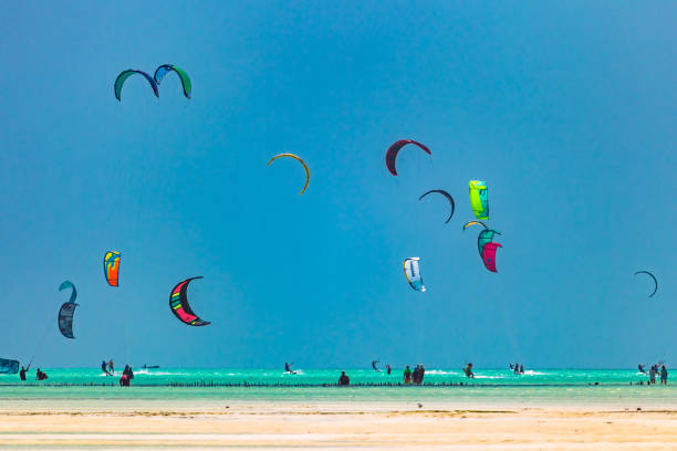Kiteboarding near Jambiani Zanzibar shallow warm waters with constant wind ideal for kitesurfing in Tanzania Indian Ocean