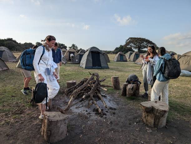 Affordable Solo Safari in Tanzania 2026 travelers enjoying public campsite experience in Ngorongoro Conservation Area