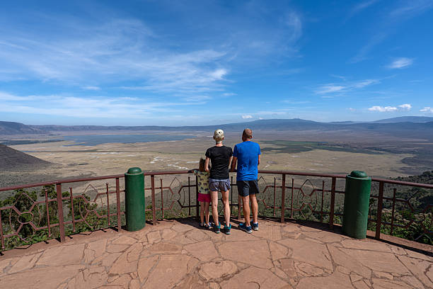 Kids Friendly Safari in Tanzania showing a family with one child enjoying the beautiful scenery of Ngorongoro Conservation Area
