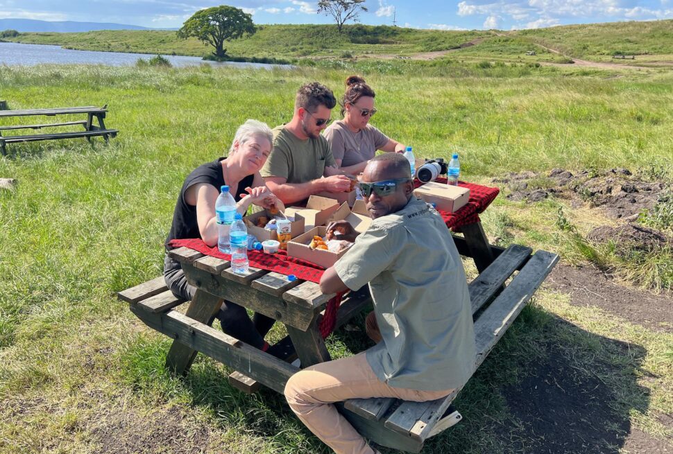 Tanzania safari seasons peaceful picnic experience near hippo pool where visitors stop for lunch during game drive