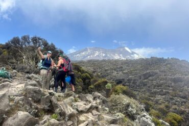Machame Route Cost vs Other Kilimanjaro Routes climbers group trekking on Mount Kilimanjaro in Tanzania