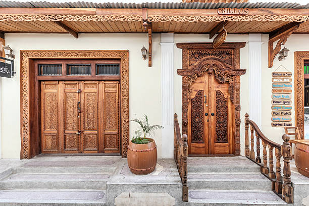 Beautiful carved wooden door in Stone Town Zanzibar showcasing traditional Swahili architecture during a Stone Town Walking Tour