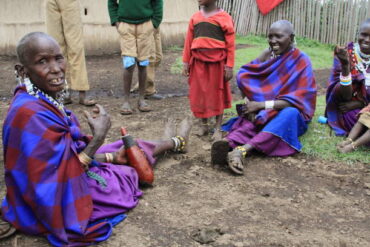 Cultural Tourism Experiences in Tanzania featuring Maasai women and children in a traditional village near Ngorongoro Crater
