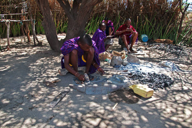 People going about daily life in a traditional village near Lake Eyasi, Tanzania