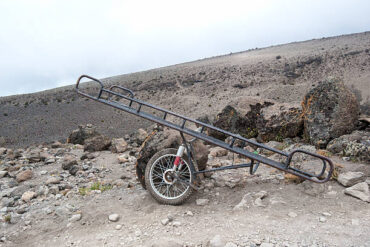 Common Kilimanjaro injuries: emergency rescue gurney carrying an injured climber on Mount Kilimanjaro, Tanzania