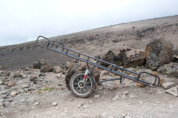 Common Kilimanjaro injuries: emergency rescue gurney carrying an injured climber on Mount Kilimanjaro, Tanzania