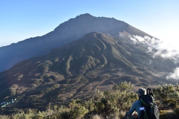 Clouds sweeping over Mount Meru Tanzania