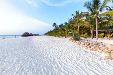Kendwa Beach Zanzibar with an overwater wooden bungalow