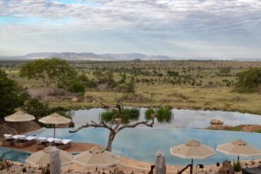 Four Seasons Safari Lodge Serengeti luxury accommodation overlooking the wildlife waterhole