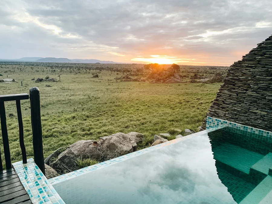 Sunrise over the Serengeti savannah landscape near Four Seasons Safari Lodge Serengeti